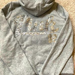 VICTORIA SECRET “PINK” Full zip fur sequence jacket; NWOT. Excellent condition.